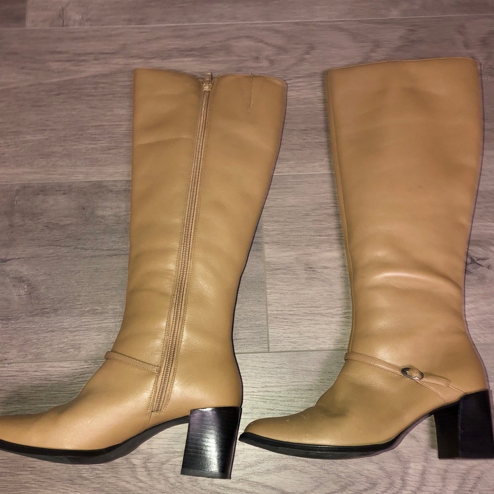 Tall leather boots with small heel